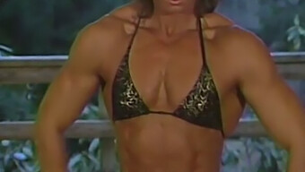 Joanne Mccartney'S Sultry Indoor Display In Black And Gold Bikinis