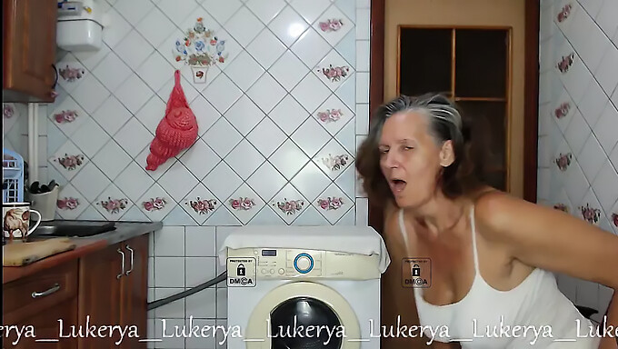 Enjoy a steamy cup of coffee with the irresistible Lukerya, a mature beauty with natural, big boobs and a big ass.