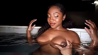 Black Beauty Gets Her Tits Fucked In The Pool